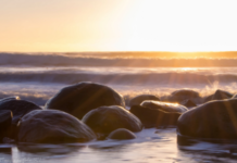 Cleansing crystals: Restoring their highest vibration Rocks in the water, photo by Images by John 'K'