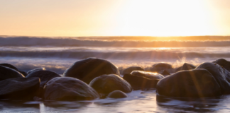 Cleansing crystals: Restoring their highest vibration Rocks in the water, photo by Images by John 'K'