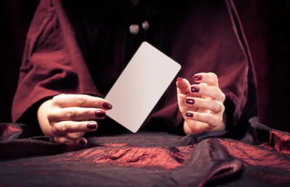 Hands holding a blank card