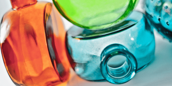 Coloured glass bottles, photo by callmekato