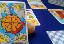Learning tarot: Three ways to read the cards everyday Detail of Wheel of Fortune, Rider Tarot, by Pamela Colman Smith, photo by Numerology Sign