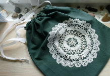 Petrified wood spirit bags: Reaching through ancient roots Drawstring pouch with lace detail, photo by storebukkebruse