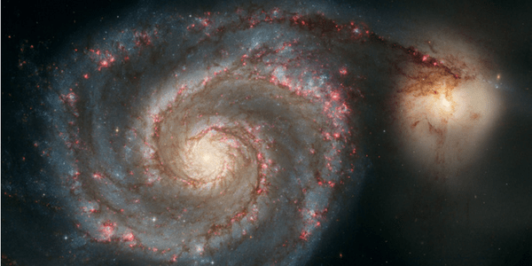 Whirlpool Galaxy M51, photo by Hubble Heritage