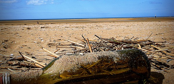 Bottle at sea, photo by Mo