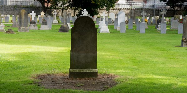 Gravestone in a cemetery, photo by William Murphy